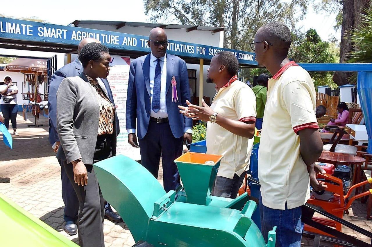 Officials inspecting climate-smart agriculture equipment