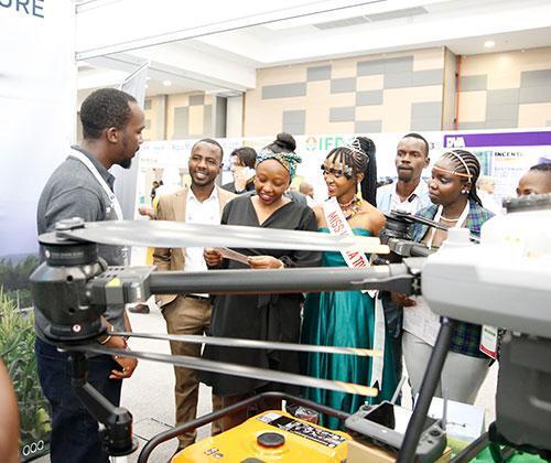 Visitors viewing agricultural drone technology